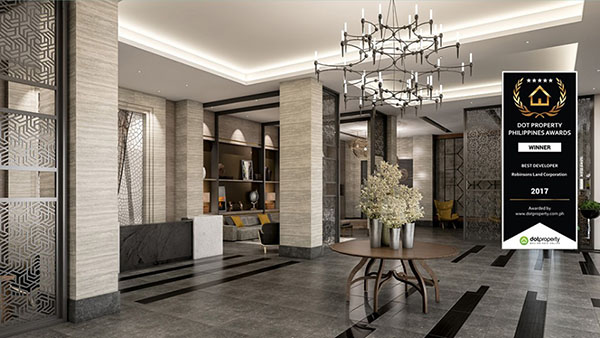 the grandiose reception and lobby area of the condo