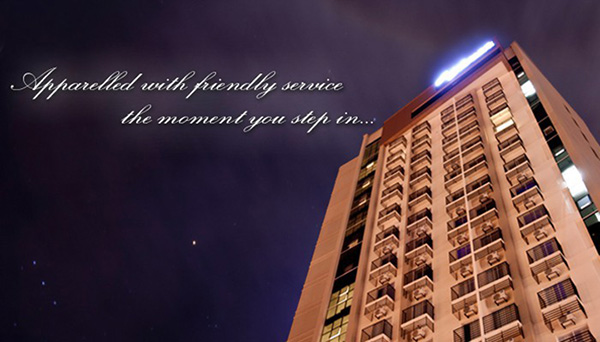 facade of cityscape tower condominium at night time