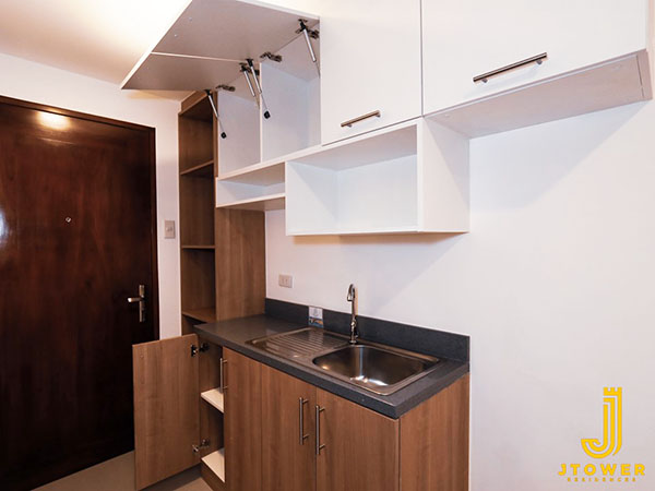 cabinets at the model unit in the condominium project